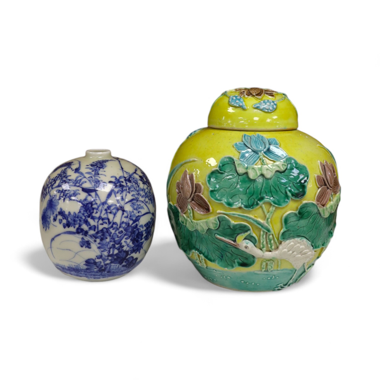 A Chinese polychrome glazed jar and cover, a Wangbinrong mark and a Japanese jar, jar and cover 14.5cm high. Condition - good